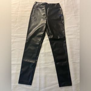 Woman’s leather-like pants size small. Brand new with tags.